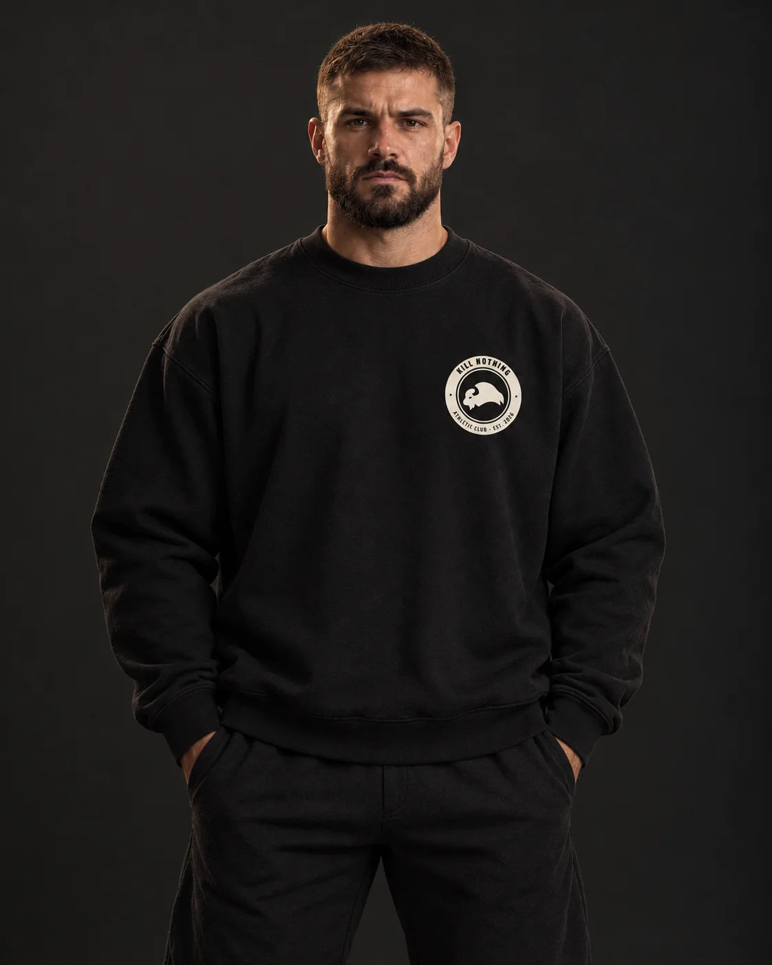 Club Crest - Crewneck Sweatshirt, black, worn by an athlete, studio photo (AI-generated image)