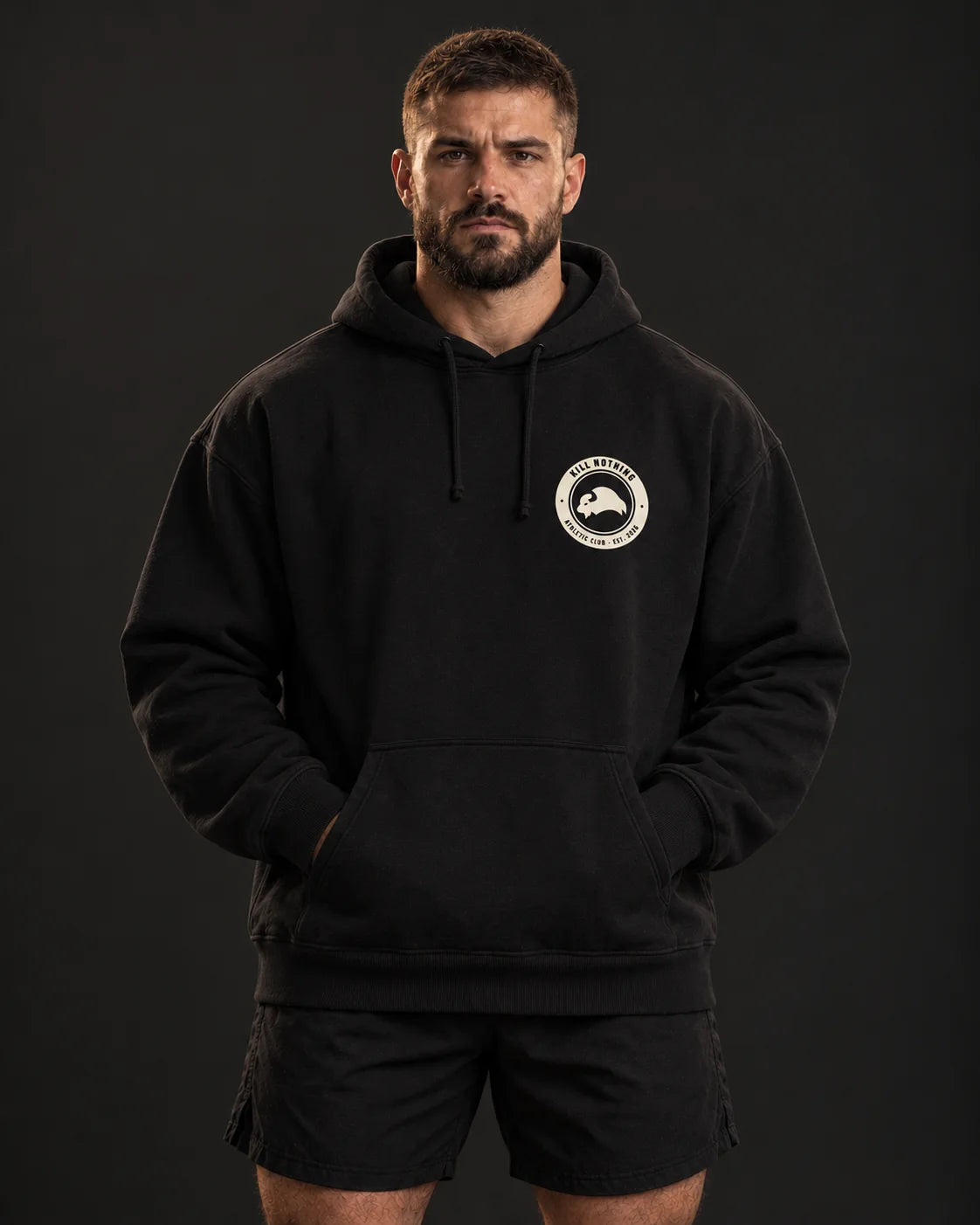 Club Crest - Hoodie, black, worn by an athlete, studio photo (AI-generated image)