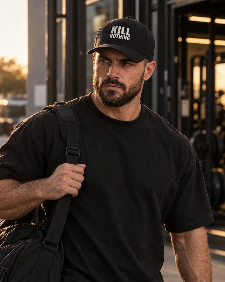 Embroidered Logo - Cap, black, worn by an athlete in the gym (AI-generated image)