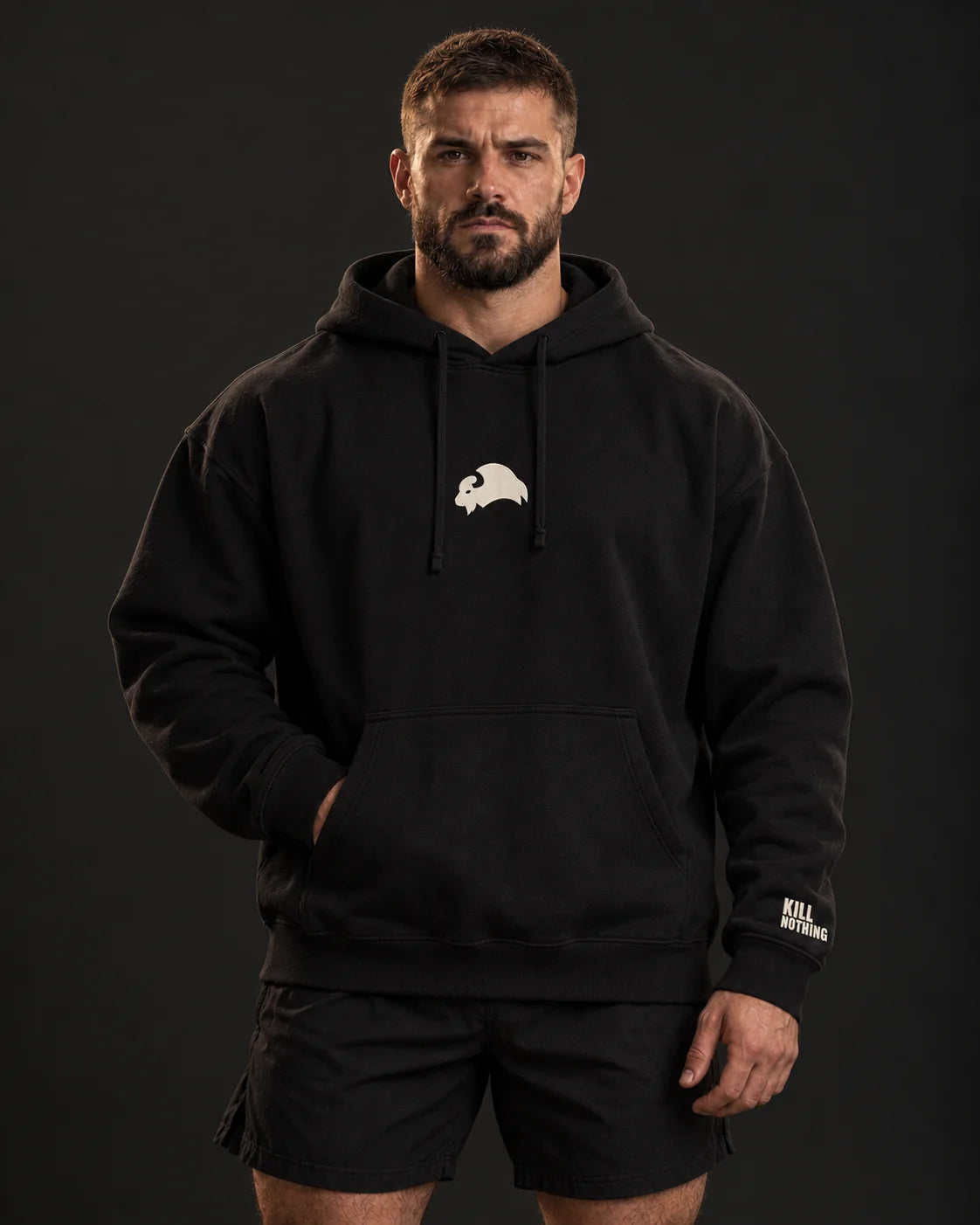 Embroidered Bison - Hoodie, black, worn by an athlete, studio photo (AI-generated image)