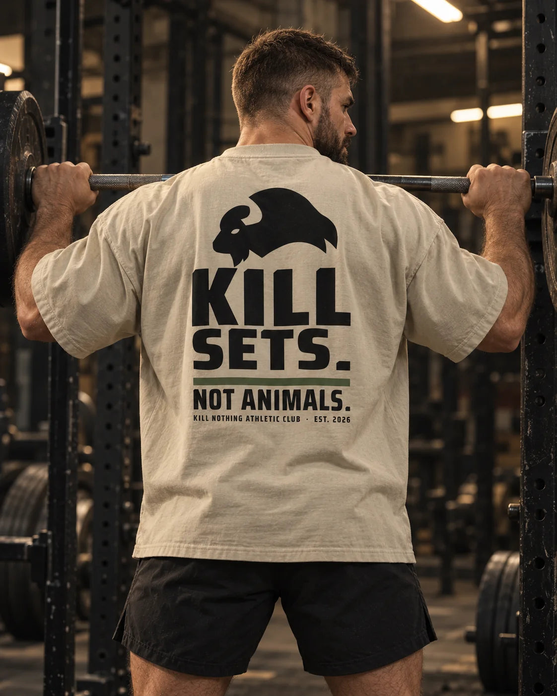 Kill Sets. Not Animals. - Oversized Tee, stone, worn by an athlete in the gym (AI-generated image)