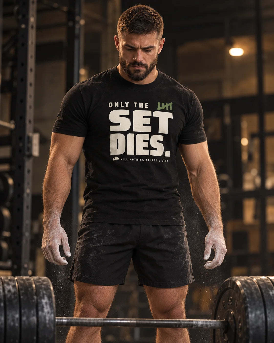 Only The Set Dies. - Slim Tee, black, worn by an athlete in the gym (AI-generated image)