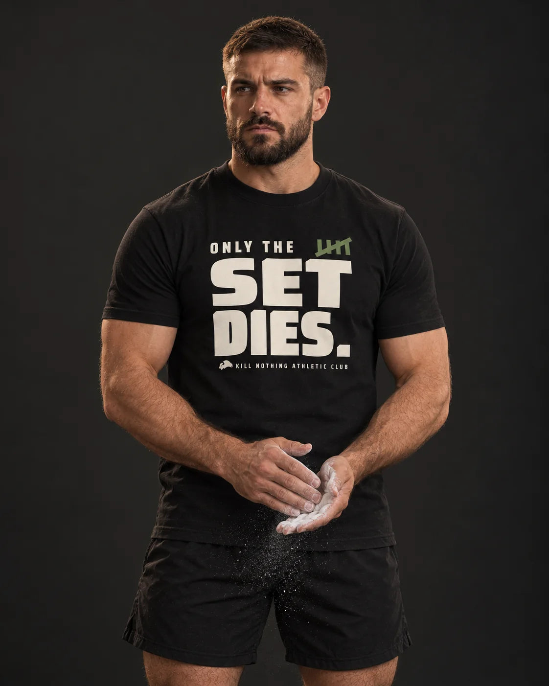 Only The Set Dies. - Slim Tee, black, worn by an athlete, studio photo (AI-generated image)