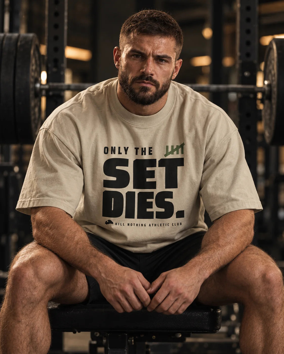 Only The Set Dies. - Oversized Tee, stone, worn by an athlete in the gym (AI-generated image)
