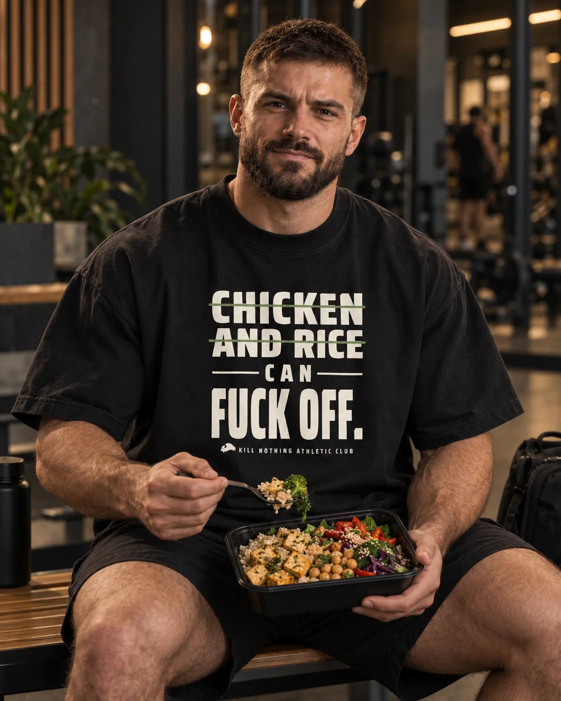 Chicken and Rice - Oversized Tee, black, worn by an athlete in the gym (AI-generated image)