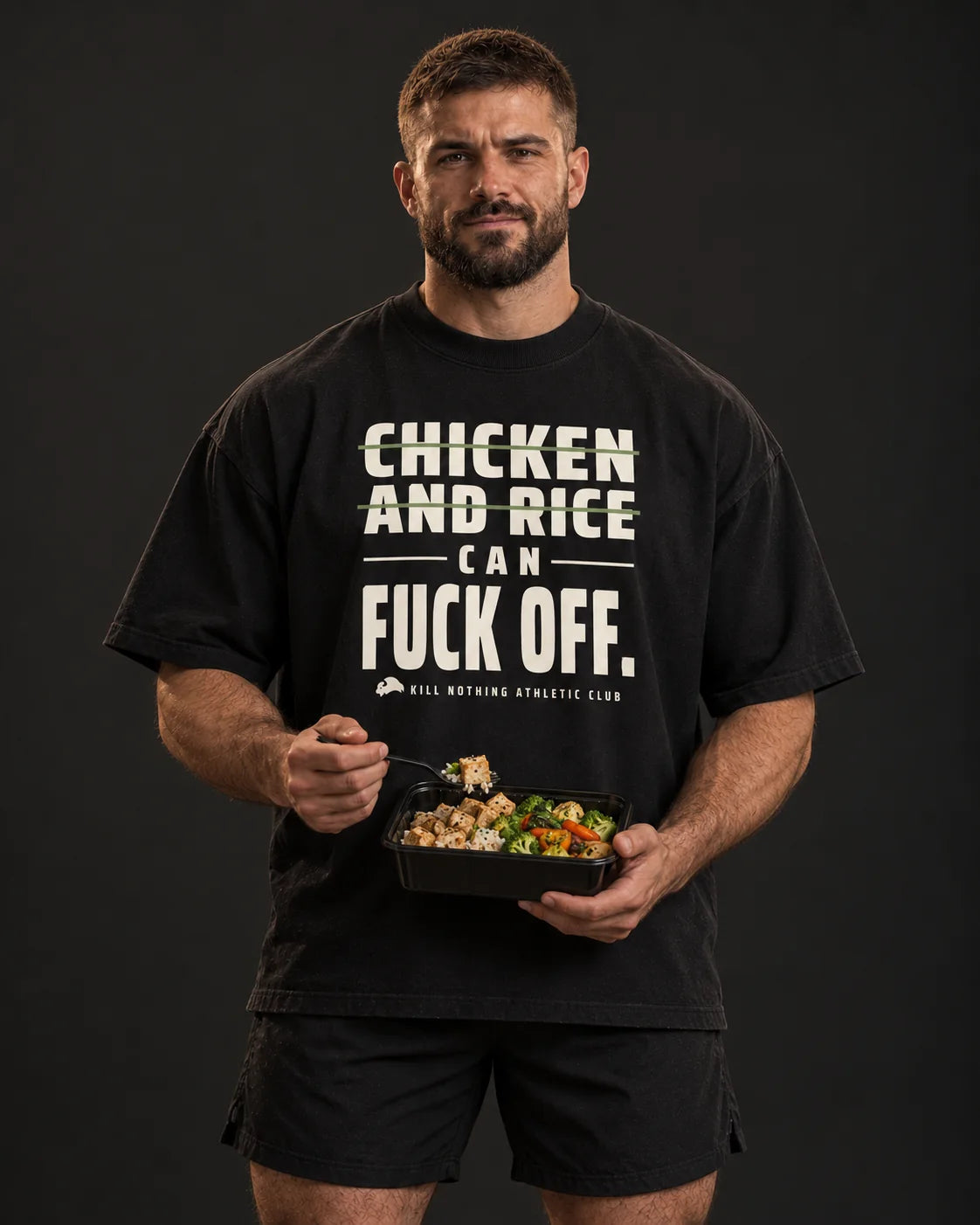 Chicken and Rice - Oversized Tee, black, worn by an athlete, studio photo (AI-generated image)