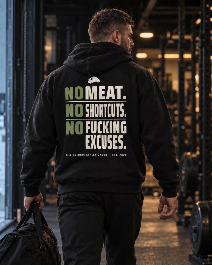 No Meat. No Shortcuts. - Hoodie, black, worn by an athlete in the gym (AI-generated image)