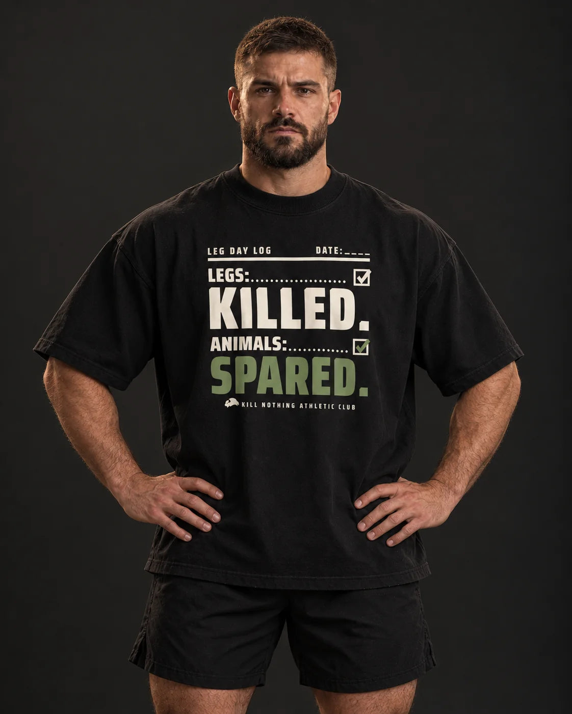 Legs: Killed. - Oversized Tee, black, worn by an athlete, studio photo (AI-generated image)